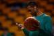 BOSTON, MA - JANUARY 15: Rajon Rondo #9 of the Boston Celtics warms up prior to the game against the Toronto Raptors at TD Garden on January 15, 2014 in Boston, Massachusetts. NOTE TO USER: User expressly acknowledges and agrees that, by downloading and o