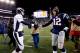 FOXBORO, MA - NOVEMBER 24: Quarterback Peyton Manning #18 of the Denver Broncos and quarterback Tom Brady #12 of the New England Patriots shake hands after the New England Patriots defeated the Denver Broncos 34-31 in overtime at Gillette Stadium on Novem