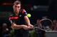 PARIS, FRANCE - OCTOBER 31: Jerzy Janowicz of Poland in action against Rafael Nadal of Spain during day four of the BNP Paribas Masters at Palais Omnisports de Bercy on October 31, 2013 in Paris, France. (Photo by Julian Finney/Getty Images)