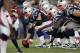 Oct 7, 2012; Foxboro, Massachusetts, USA; New England Patriots center Ryan Wendell (62) at the line of scrimmage during the fourth quarter against the Denver Broncos at Gillette Stadium. The New England Patriots won 31-21. Mandatory Credit: Greg M. Coop