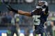 SEATTLE, WA - JANUARY 11: Cornerback Richard Sherman #25 of the Seattle Seahawks reacts in the second quarter while taking on the New Orleans Saints during the NFC Divisional Playoff Game at CenturyLink Field on January 11, 2014 in Seattle, Washington.