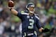 SEATTLE, WA - JANUARY 11: Quarterback Russell Wilson #3 of the Seattle Seahawks throws the ball in the second half while taking on the New Orleans Saints during the NFC Divisional Playoff Game at CenturyLink Field on January 11, 2014 in Seattle, Washingt