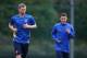 Per Mertesacker and Mesut Ozil in a training session.