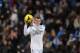MADRID, SPAIN - NOVEMBER 30: Gareth Bale of Real Madrid CF takes away the match ball after scoring his first hat-trick for Real Madrid CF at the end of the La Liga match between Real Madrid CF and Real Valladolid CF at Santiago Bernabeu stadium on Novemb