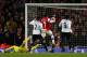 LONDON, ENGLAND - JANUARY 04: Tomas Rosicky of Arsenal chips the ball over goalkeeper Hugo Lloris of Spurs to score his team'ssecond goal during the Budweiser FA Cup third round match between Arsenal and Tottenham Hotspur at Emirates Stadium on January 4