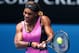 MELBOURNE, AUSTRALIA - JANUARY 15: Serena Williams of the United States plays a backhand in her second round match against Vesna Dolonc of Serbia during day three of the 2014 Australian Open at Melbourne Park on January 15, 2014 in Melbourne, Australia.