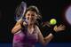 MELBOURNE, AUSTRALIA - JANUARY 16: Victoria Azarenka of Belarus plays a forehand in her second round match against Barbora Zahlavova Strycova of the Czech Republic during day four of the 2014 Australian Open at Melbourne Park on January 16, 2014 in Melbo