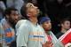 Jan 9, 2014; New York, NY, USA; New York Knicks shooting guard J.R. Smith (8) watches the final seconds of the game from the bench during the fourth quarter of a game against the Miami Heat at Madison Square Garden. Smith didn't play in the game. Mandator