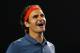 MELBOURNE, AUSTRALIA - JANUARY 08: Roger Federer of Switzerland reacts after winning a point in his match against Jo Wilfried Tsonga of Francce during the Roger Federer Charity Match at Melbourne Park on January 8, 2014 in Melbourne, Australia. (Photo b