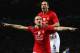 MANCHESTER, UNITED KINGDOM - MARCH 11: Nemanja Vidic of Manchester United celebrates scoring the opening goal with team mate Rio Ferdinand (R) during the UEFA Champions League Round of Sixteen, Second Leg match between Manchester United and Inter Milan a