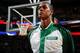 BOSTON, MA - JANUARY 15: Rajon Rondo #9 of the Boston Celtics during the national anthem before the game against the Toronto Raptors on January 15, 2014 at the TD Garden in Boston, Massachusetts. NOTE TO USER: User expressly acknowledges and agrees that,