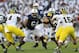 Oct 12, 2013; University Park, PA, USA; Penn State Nittany Lions guard John Urschel (64) attempts to block during the second quarter against the Michigan Wolverines at Beaver Stadium. Penn State defeated Michigan 43-40 in overtime. Mandatory Credit: Matth