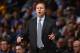 DENVER, CO - JANUARY 09: Head coach Scott Brooks of the Oklahoma City Thunder leads his team against the Denver Nuggets at Pepsi Center on January 9, 2014 in Denver, Colorado. NOTE TO USER: User expressly acknowledges and agrees that, by downloading and