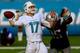 MIAMI GARDENS, FL - DECEMBER 15: Ryan Tannehill #17 of the Miami Dolphins attempts to pass the ball under pressure from Chandler Jones #95 of the New England Patriots at Sun Life Stadium on December 15, 2013 in Miami Gardens, Florida. (Photo by Chris T