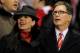LIVERPOOL, ENGLAND - JANUARY 25: Liverpool owner John Henry and wife Linda Pizzuti look on prior to the Carling Cup Semi Final Second Leg match between Liverpool and Manchester City at Anfield on January 25, 2012 in Liverpool, England. (Photo by Michae