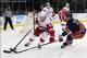 Jan 16, 2014; New York, NY, USA; New York Rangers right wing Ryan Callahan (24) knocks the puck away from Detroit Red Wings left wing Justin Abdelkader (8) during the second period at Madison Square Garden. Mandatory Credit: Adam Hunger-USA TODAY Sports