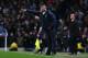 MANCHESTER, ENGLAND - DECEMBER 26: Manuel Pellegrini, manager of Manchester City gives instructions with Brendan Rodgers, manager of Liverpool during the Barclays Premier League match between Manchester City and Liverpool at Etihad Stadium on December 26