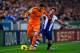 BARCELONA, SPAIN - JANUARY 12: Gareth Bale of Real Madrid CF duels for the ball with Victor Sanchez of RCD Espanyol during the La Liga match between RCD Espanyol and Real Madrid CF at Cornella-El Prat Stadium on January 12, 2014 in Barcelona, Spain. (Ph