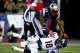FOXBORO, MA - NOVEMBER 24: Middle linebacker Brandon Spikes #55 of the New England Patriots tackles quarterback Peyton Manning #18 of the Denver Broncos during a game at Gillette Stadium on November 24, 2013 in Foxboro, Massachusetts. (Photo by Jared Wi