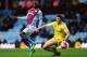 BIRMINGHAM, ENGLAND - JANUARY 04: Christian Benteke of Aston Villa is closed down by Harry Maguire of Sheffield United during the Budweiser FA Cup third round match between Aston Villa and Sheffield United at Villa Park on January 4, 2014 in Birmingham, E