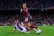 BARCELONA, SPAIN - OCTOBER 05: Christian Tello of FC Barcelona duels for the ball with Antonio Rukavina of Real Valladolid CF during the La Liga match between FC Barcelona and Real Valladolid CF at Camp Nou on October 5, 2013 in Barcelona, Spain. (Photo