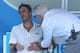 MELBOURNE, AUSTRALIA - JANUARY 17: Eduardo Roger-Vasselin of France receives medical attention in his third round match against Kevin Anderson of South Africa during day five of the 2014 Australian Open at Melbourne Park on January 17, 2014 in Melbourne,
