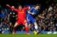 LONDON, ENGLAND - DECEMBER 29: Frank Lampard of Chelsea is tackled by Joe Allen of Liverpool during the Barclays Premier League match between Chelsea and Liverpool at Stamford Bridge on December 29, 2013 in London, England. (Photo by Julian Finney/Getty