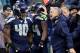 SEATTLE, WA - JANUARY 11: Head coach Pete Carroll of the Seattle Seahawks celebrates with running back Marshawn Lynch #24 after Lynch scores a touchdown in the fourth quarter against the New Orleans Saints in the NFC Divisional Playoff Game at CenturyLin