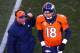 DENVER, CO - JANUARY 12: Peyton Manning #18 talks to head coach John Fox of the Denver Broncos in a time out in the first quarter during the AFC Divisional Playoff Game at Sports Authority Field at Mile High on January 12, 2014 in Denver, Colorado. (Ph