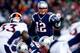 FOXBORO, MA - NOVEMBER 24: Quarterback Tom Brady #12 of the New England Patriots calls a play against the Denver Broncos during a game at Gillette Stadium on November 24, 2013 in Foxboro, Massachusetts. (Photo by Jared Wickerham/Getty Images)