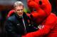 MANCHESTER, ENGLAND - JANUARY 11: Manchester United Manager David Moyes is greeted by mascot Fred the Red prior to the Barclays Premier League match between Manchester United and Swansea City at Old Trafford on January 11, 2014 in Manchester, England. (