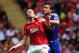 Lampard attempts to help Carrick with a neck crick.