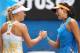MELBOURNE, AUSTRALIA - JANUARY 18: Garbine Muguruza of Spain and Caroline Wozniacki of Denmark shake hands after Muguruza won their third round match during day six of the 2014 Australian Open at Melbourne Park on January 18, 2014 in Melbourne, Australia