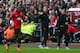 SWANSEA, WALES - AUGUST 17: David Moyes (C) the manager of Manchester United celebrates his sides third goal alongside assistant Steve Round (R) and Patrice Evra (L) during the Barclays Premier League match between Swansea City and Manchester United at th