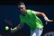 MELBOURNE, AUSTRALIA - JANUARY 17: David Ferrer of Spain plays a forehand in his third round match against Jeremy Chardy of France during day five of the 2014 Australian Open at Melbourne Park on January 17, 2014 in Melbourne, Australia. (Photo by Clive