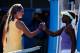 MELBOURNE, AUSTRALIA - JANUARY 24: Sloane Stephens of the United States congratulates Victoria Azarenka of Belarus on winning their Semifinal match during day eleven of the 2013 Australian Open at Melbourne Park on January 24, 2013 in Melbourne, Australi