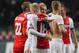 AMSTERDAM, NETHERLANDS - NOVEMBER 6: Davy Klaassen and Viktor Fischer of AFC Ajax embrace as they celebrate victory at the end of the UEFA Champion League group stage match between AFC Ajax and Celtic FC held on November 6, 2013 at the Amsterdam ArenA in