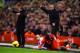 LIVERPOOL, ENGLAND - JANUARY 18: Aly Cissokho of Liverpool is challenged by Karim El Ahmadi of Aston Villa during the Barclays Premier League match between Liverpool and Aston Villa at Anfield on January 18, 2014 in Liverpool, England. (Photo by Michael