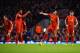 LIVERPOOL, ENGLAND - JANUARY 18: Luis Suarez (3rdR) of Liverpool looks dejected with Daniel Sturridge and Steven Gerrard after the opening goal scored by Andreas Weimann of Aston Villa during the Barclays Premier League match between Liverpool and Aston