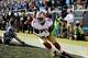 CHARLOTTE, NC - JANUARY 12: Vernon Davis #85 of the San Francisco 49ers catches a touchdown in the second quarter against the Carolina Panthers during the NFC Divisional Playoff Game at Bank of America Stadium on January 12, 2014 in Charlotte, North Caro