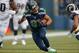 SEATTLE, WA - DECEMBER 29: Wide receiver Golden Tate #81 of the Seattle Seahawks rushes against the St. Louis Rams at CenturyLink Field on December 29, 2013 in Seattle, Washington. (Photo by Otto Greule Jr/Getty Images)