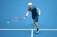 MELBOURNE, AUSTRALIA - JANUARY 18: Andy Murray of Great Britain plays a forehand in his third round match against Feliciano Lopez of Spain during day six of the 2014 Australian Open at Melbourne Park on January 18, 2014 in Melbourne, Australia. (Photo b