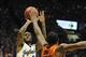 Jan 18, 2014; Lawrence, KS, USA; Kansas Jayhawks guard Naadir Tharpe (10) shoots against Oklahoma State Cowboys guard Marcus Smart (33) in the second half at Allen Fieldhouse. Kansas won 80-78. Mandatory Credit: John Rieger-USA TODAY Sports