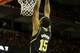 MADISON, WI - JANUARY 18: Jon Horford #15 of the Michigan Wolverines throws down a dunk with two hands during the first half of play against the Wisconsin Badgers at Kohl Center on January 18, 2014 in Madison, Wisconsin. (Photo by Mike McGinnis/Getty Imag