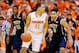 Jan 18, 2014; Syracuse, NY, USA; Syracuse Orange guard Tyler Ennis (11) controls the ball against the defense of Pittsburgh Panthers guard James Robinson (0) during the second half at the Carrier Dome. Syracuse defeated Pittsburgh 59-54. Mandatory Credi