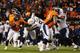 DENVER, CO - JANUARY 12: Knowshon Moreno #27 of the Denver Broncos carries the ball against the San Diego Chargers during the AFC Divisional Playoff Game at Sports Authority Field at Mile High on January 12, 2014 in Denver, Colorado. (Photo by Justin Ed