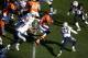 DENVER, CO - JANUARY 12: Montee Ball #28 of the Denver Broncos runs the ball against the San Diego Chargers during the AFC Divisional Playoff Game at Sports Authority Field at Mile High on January 12, 2014 in Denver, Colorado. (Photo by Doug Pensinger/