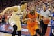 Jan 18, 2014; Lawrence, KS, USA; Oklahoma State Cowboys guard Markel Brown (22) drives to the basket against Kansas Jayhawks guard Brannen Greene (14) in the first half at Allen Fieldhouse. Mandatory Credit: John Rieger-USA TODAY Sports