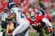 SAN FRANCISCO, CA - DECEMBER 08: Linebacker Aldon Smith #99 of the San Francisco 49ers takes aim at running back Marshawn Lynch #24 of the Seattle Seahawks in the first quarter on December 8, 2013 at Candlestick Park in San Francisco, California. The 49