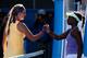 MELBOURNE, AUSTRALIA - JANUARY 24: Sloane Stephens of the United States congratulates Victoria Azarenka of Belarus on winning their Semifinal match during day eleven of the 2013 Australian Open at Melbourne Park on January 24, 2013 in Melbourne, Australi